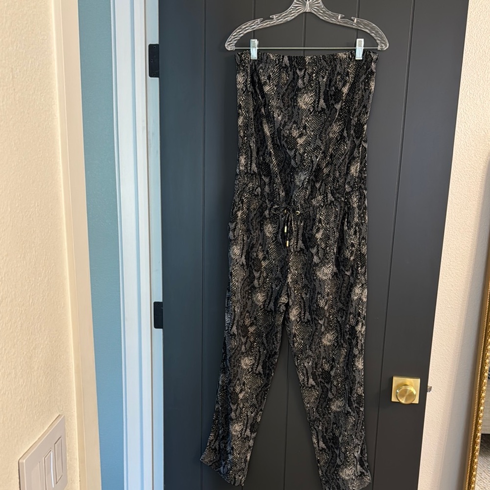 Express Black Jumpsuit with Modern Camouflage Pattern